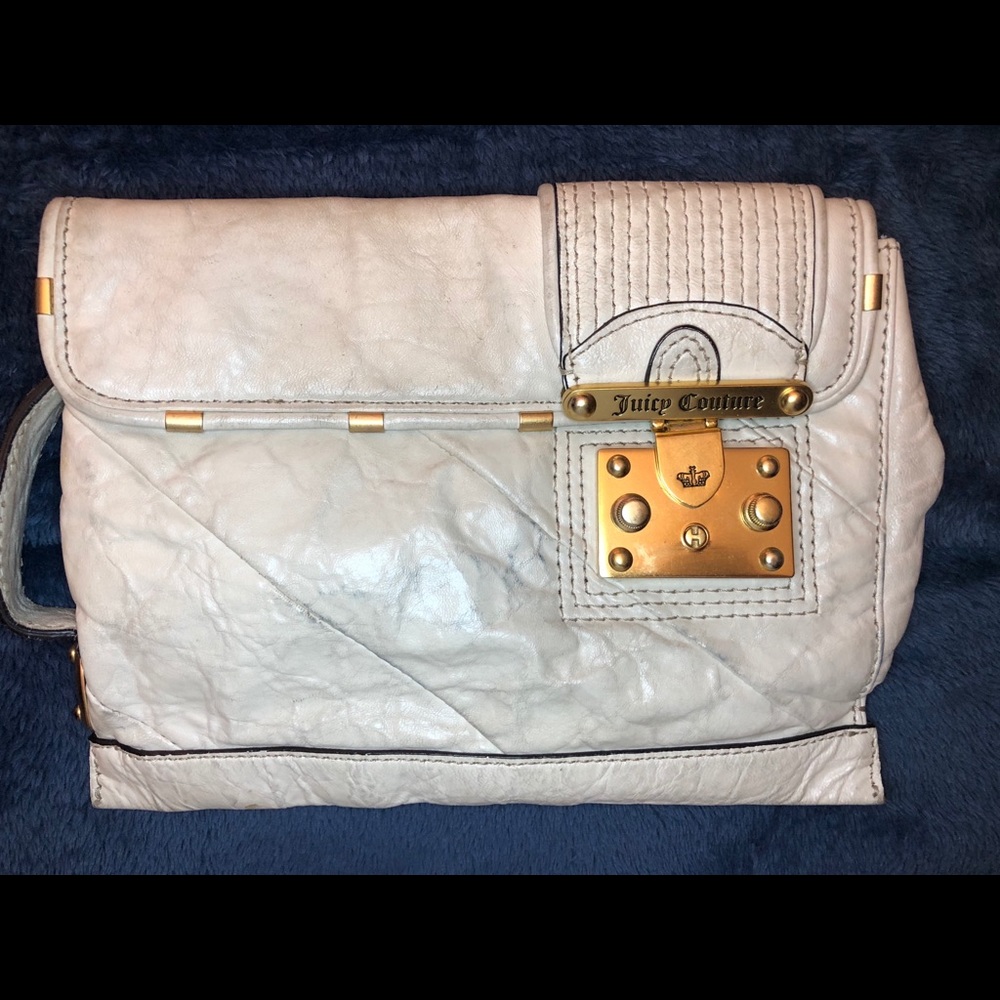 Juicy couture off white see you leather clutch